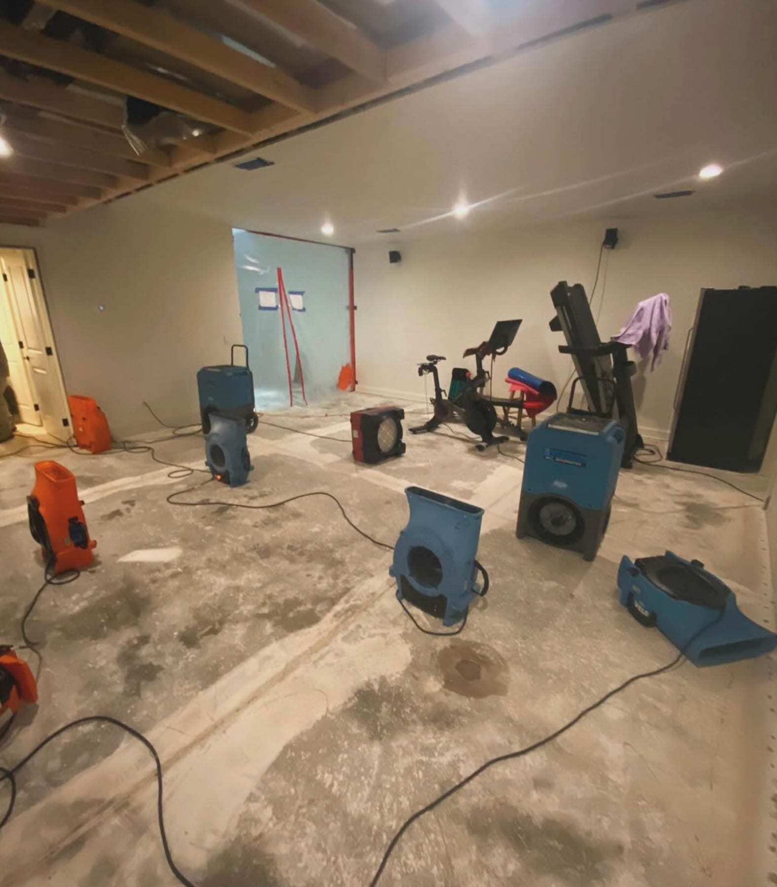 Basement drying with air movers and dehumidifiers
